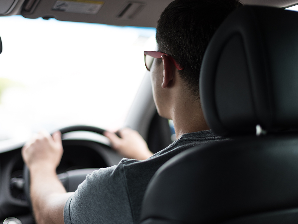 img of a man driving