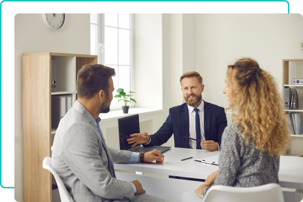 Two people meeting with an independent insurance broker