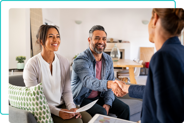A consultant and a couple talking about insurance