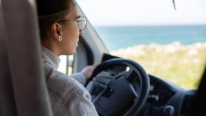 A woman driving a car