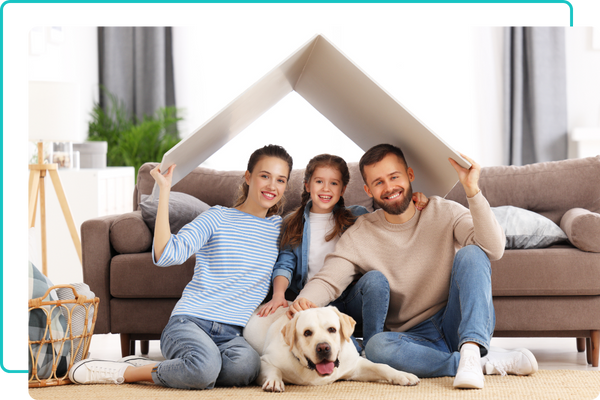 family under carboard roof